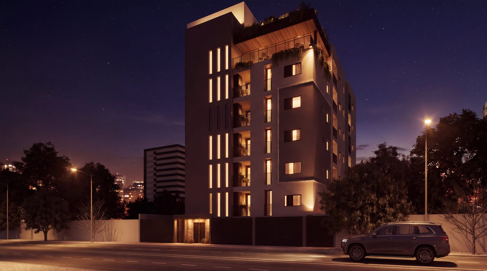 Fachada do Residencial Essence ao anoitecer